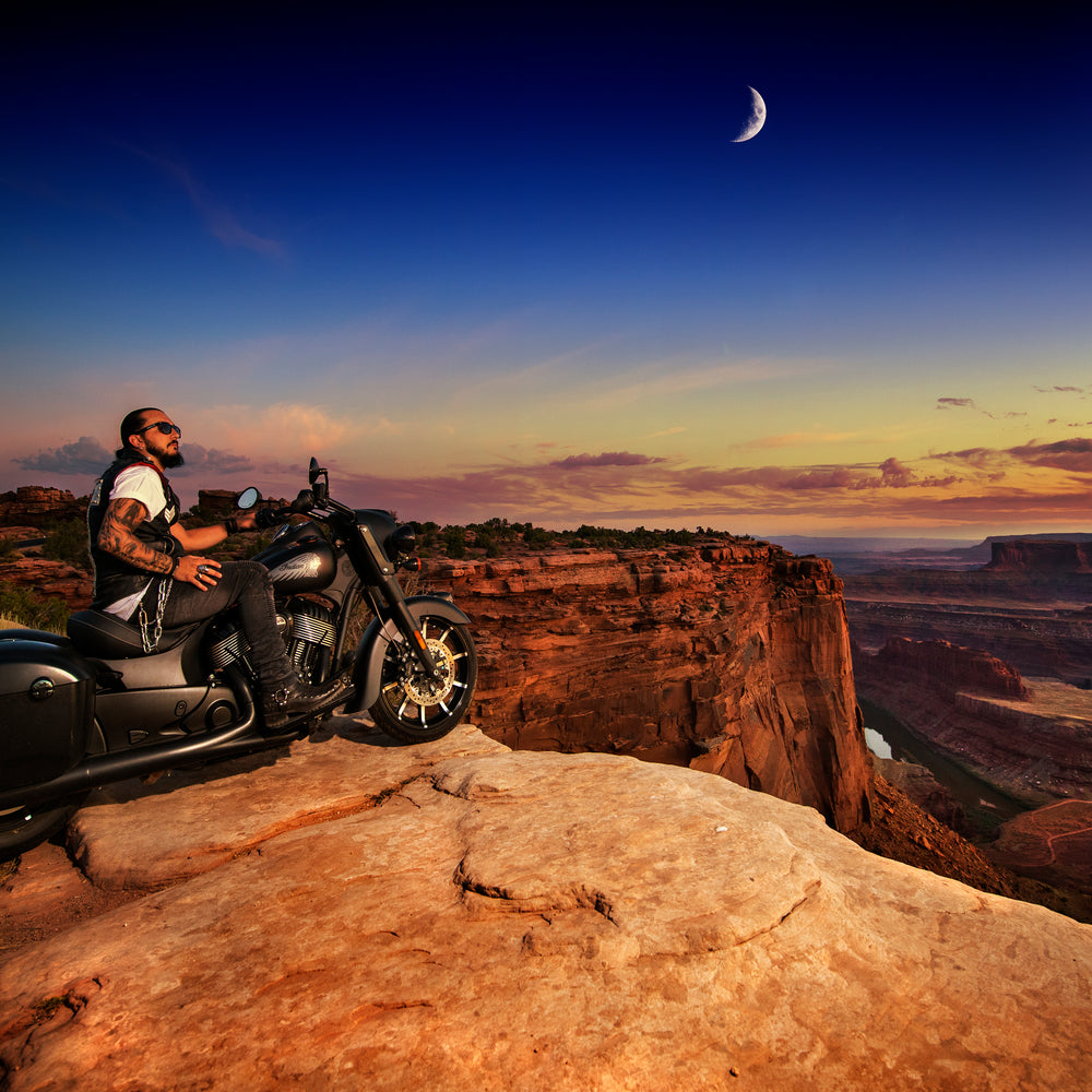 Singer Crucifix on an Indian Motorcycle parked at the edge of Dead Horse Point in Moab Utah. SaintCruce