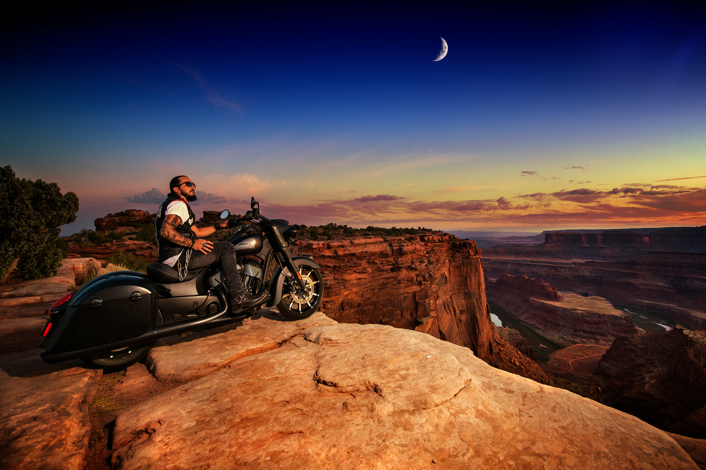 Singer Crucifix on an Indian Motorcycle parked at the edge of Dead Horse Point in Moab Utah. SaintCruce