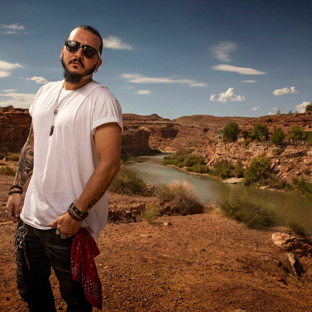 Singer Crucifix walks along the San Juan River in Mexican Hat Utah. SaintCruce