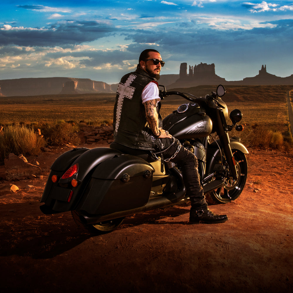 Singer Crucifix on Indian Motorcycle at Forrest Gump Point in Monument Valley Arizona. SaintCruce